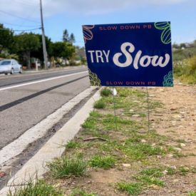 Shows slow street sign in Pacific Beach
